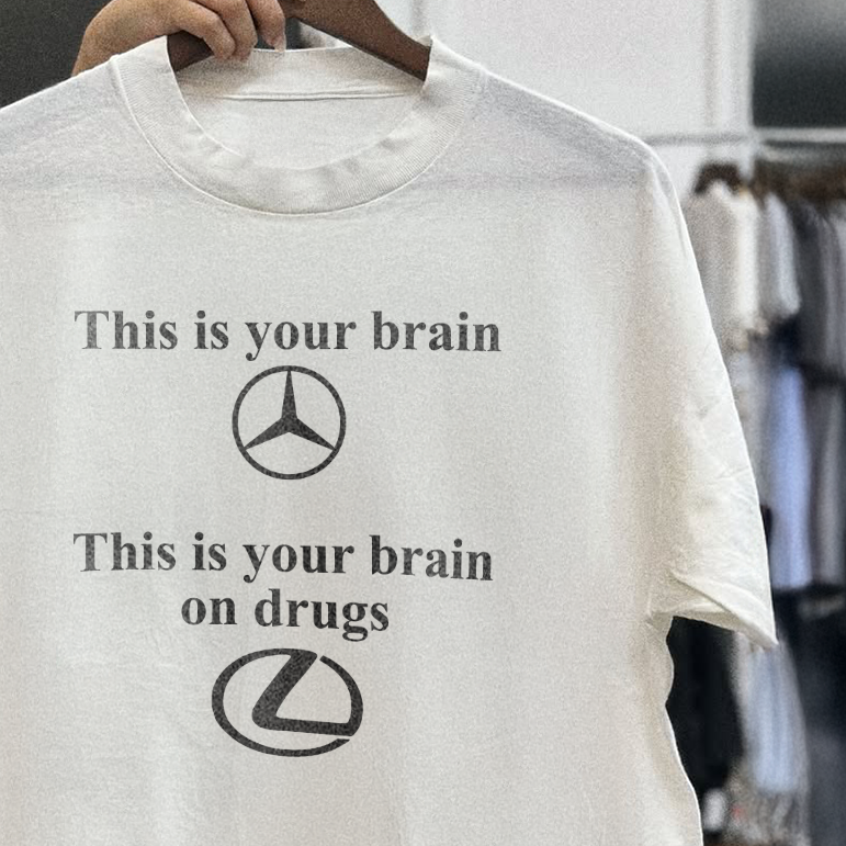 THIS IS YOUR BRAIN / THIS IS YOUR BRAIN ON DRUGS” MERCEDES vs LEXUS LIMITED WHITE T-SHIRT