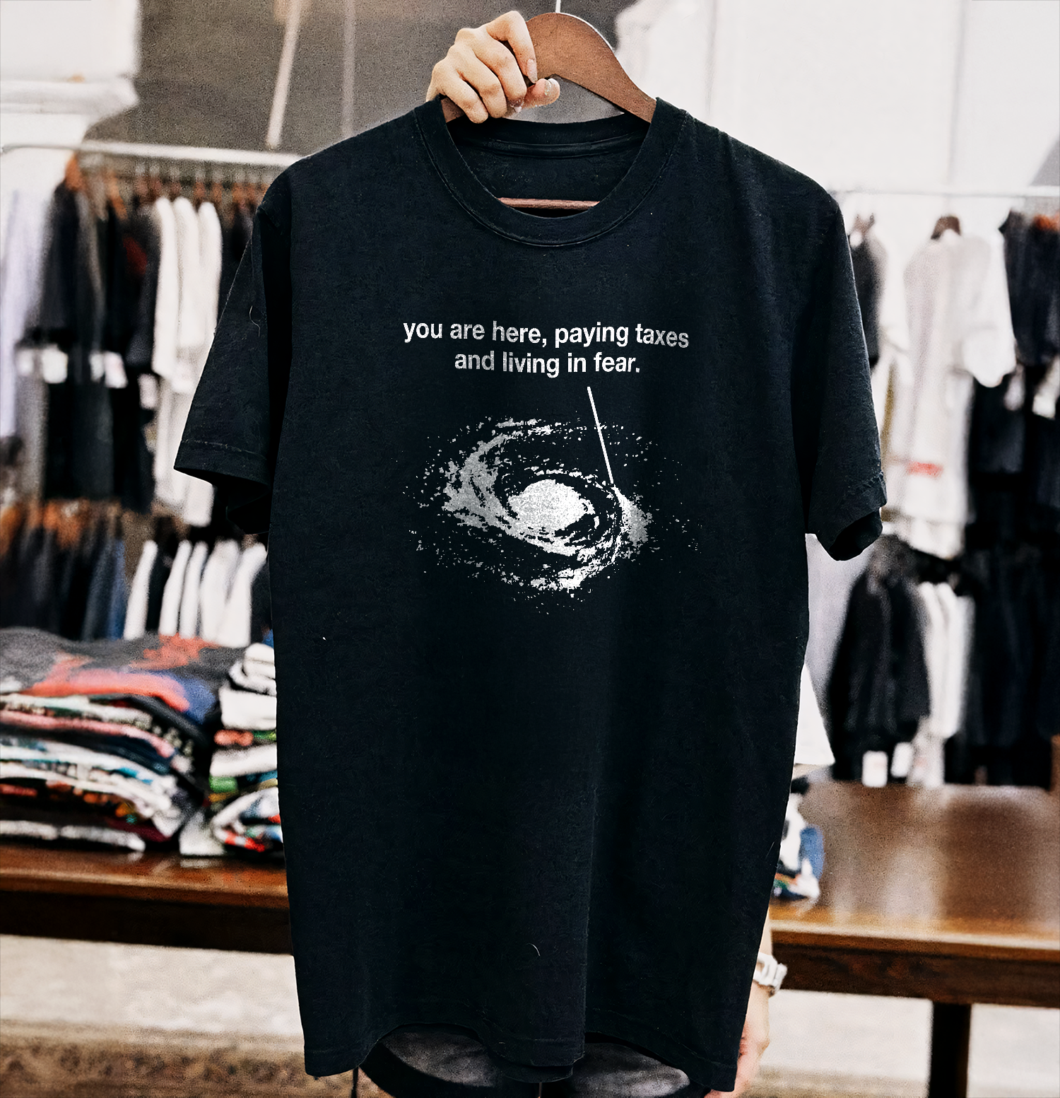 YOU ARE HERE, PAYING TAXES & LIVING IN FEAR” COSMIC EXISTENTIAL BLACK T-SHIRT